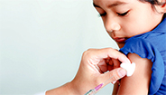 Child receiving immunization shot