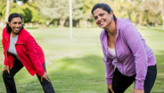 Two women stretching